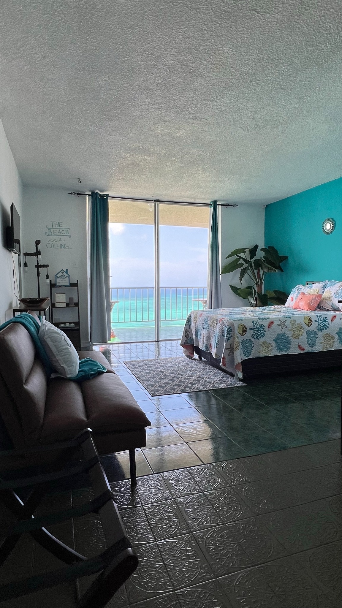 Bright beach-inspired studio with ocean view